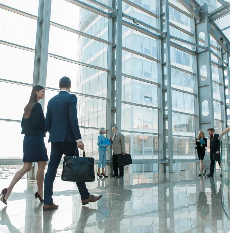 Employees are walking in the hallway Employees are walking in the hallway